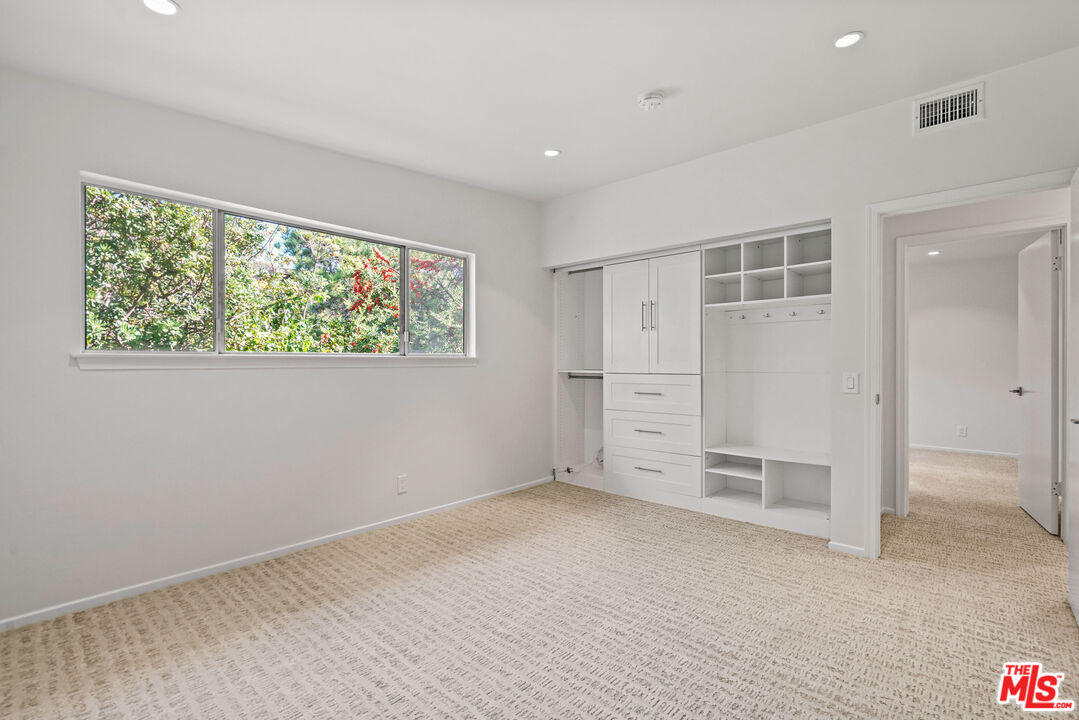 3444 Cloudcroft Drive Malibu, CA 90265 - Photo 41 of 50 an empty room with windows