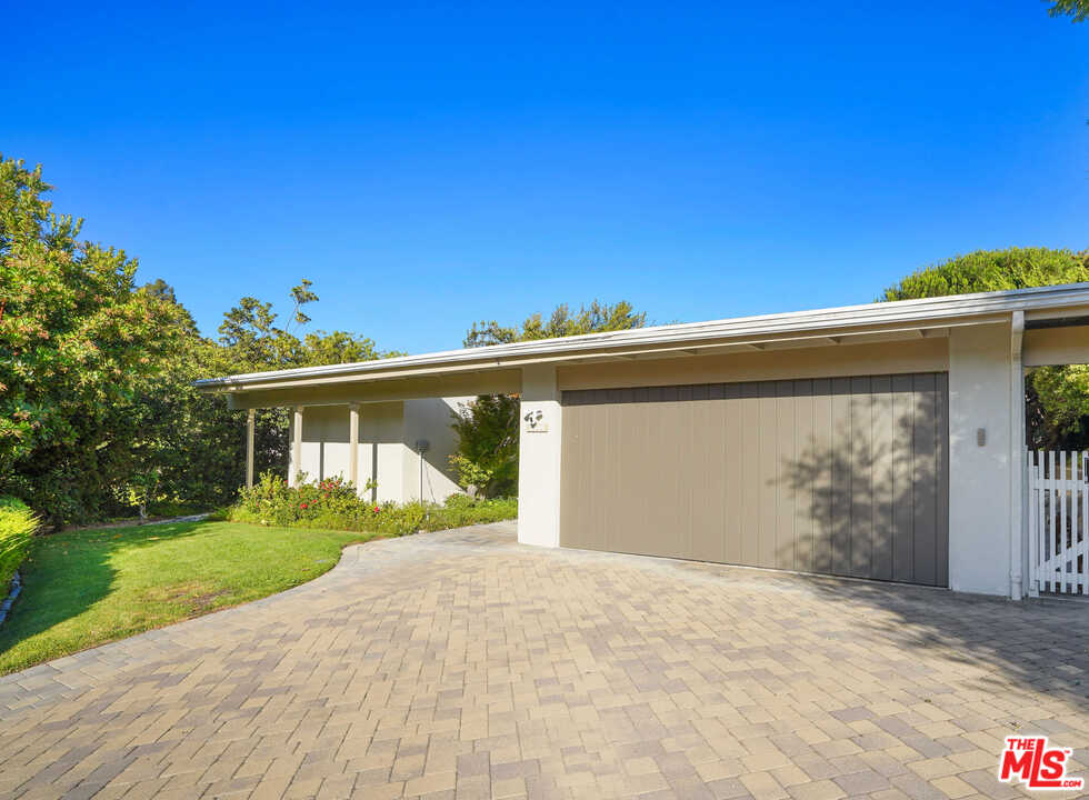 3444 Cloudcroft Drive Malibu, CA 90265 - Photo 45 of 50 a view of a house with a yard