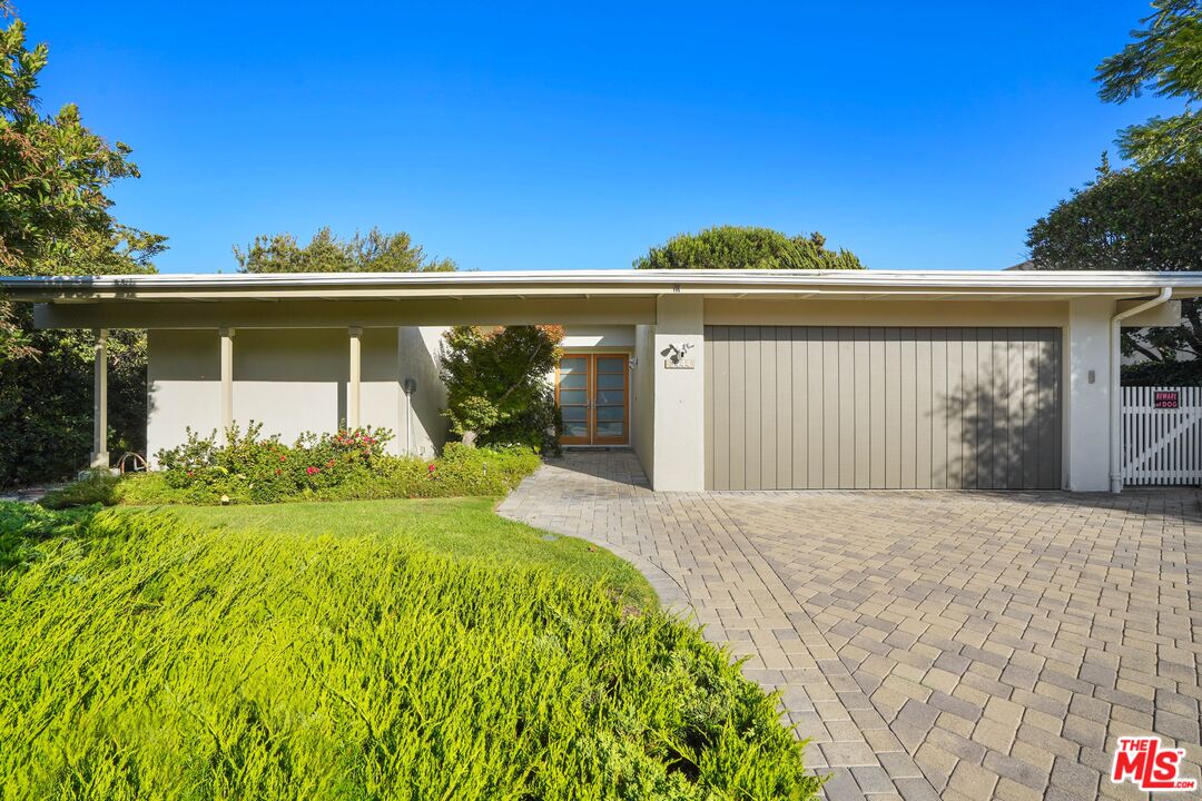 3444 Cloudcroft Drive Malibu, CA 90265 - Photo 50 of 50 a front view of a house with garden