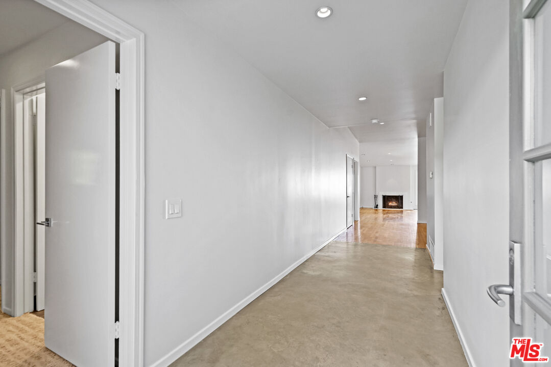 3444 Cloudcroft Drive Malibu, CA 90265 - Photo 7 of 50 a view of a hallway with wooden floor
