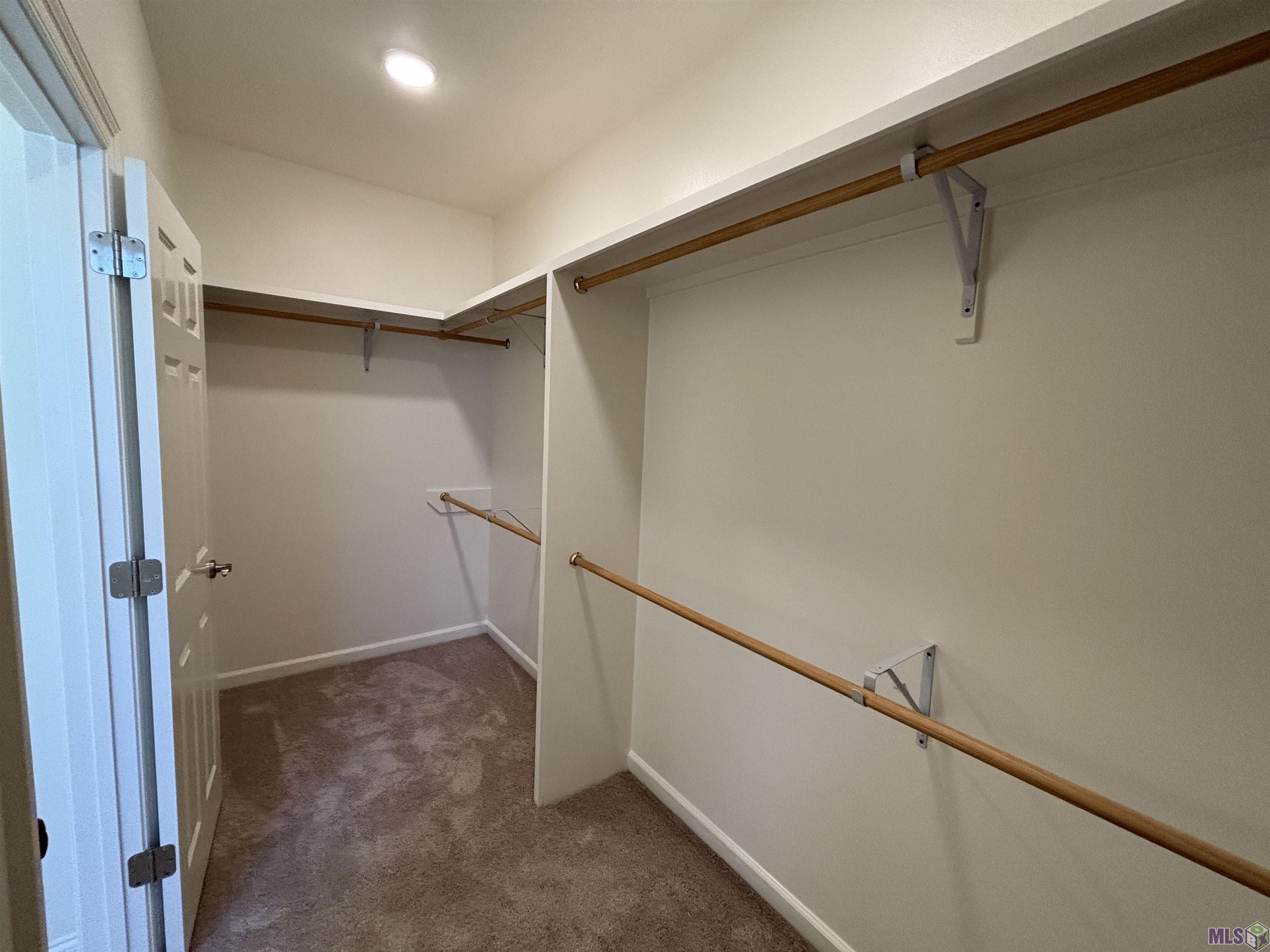 7047 Sweetspire Drive Baton Rouge, LA 70817 - Photo 14 of 25 PRIMARY CLOSET