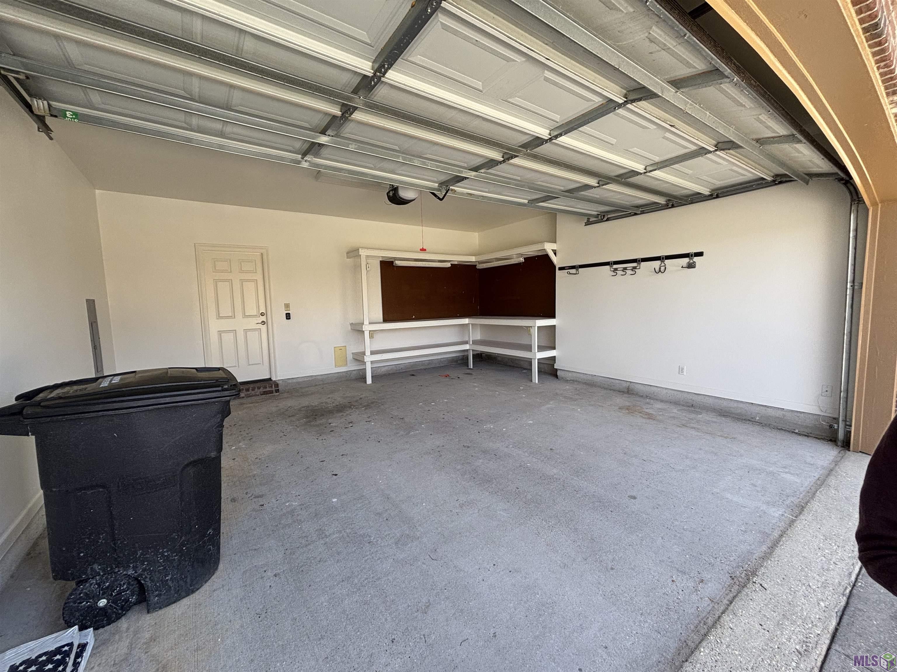 7047 Sweetspire Drive Baton Rouge, LA 70817 - Photo 25 of 25 GARAGE WITH STORAGE SPACE