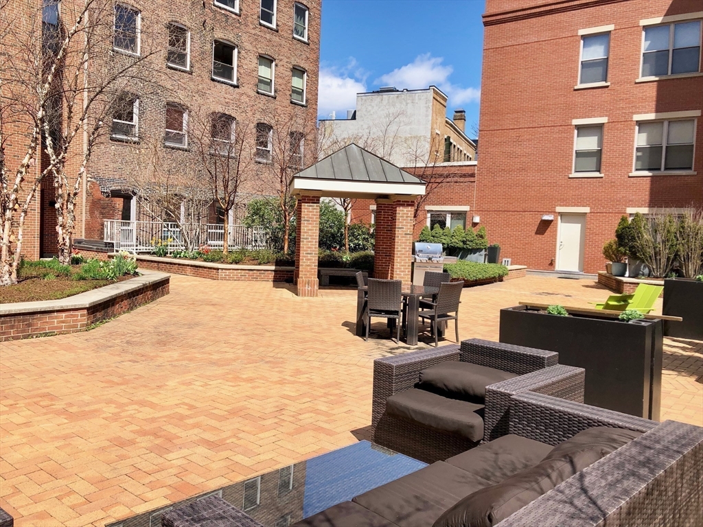 35 Fay Street, Unit 315 Boston, MA 02118 - Photo 8 of 8 a view of a building with a patio