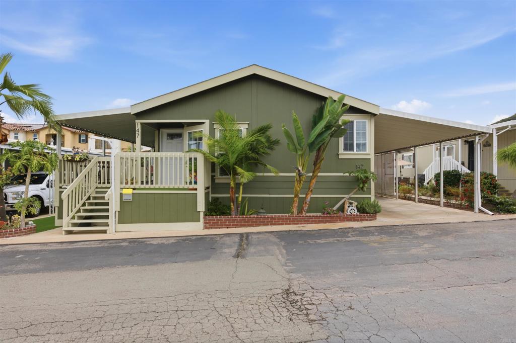 8545 Mission Gorge Road, Unit SPC #147 Santee, CA 92071 - Photo 1 of 43 a view of backyard with deck and outdoor seating