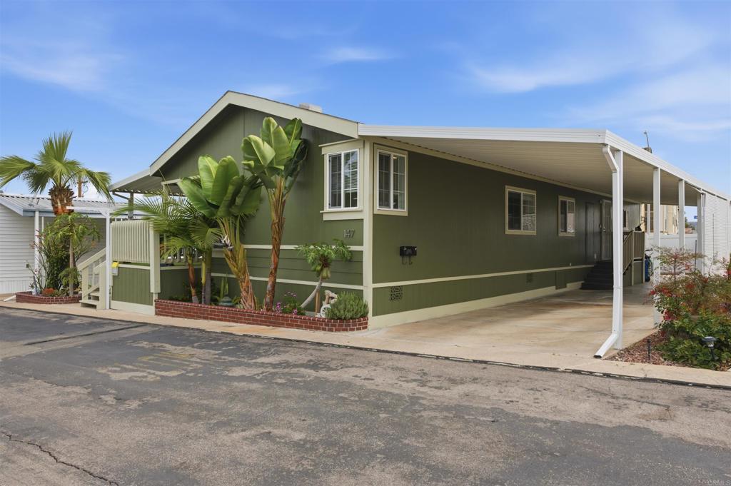 8545 Mission Gorge Road, Unit SPC #147 Santee, CA 92071 - Photo 3 of 43 a backyard of a house