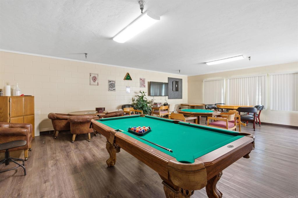 8545 Mission Gorge Road, Unit SPC #147 Santee, CA 92071 - Photo 39 of 43 a room with furniture pool table and chairs