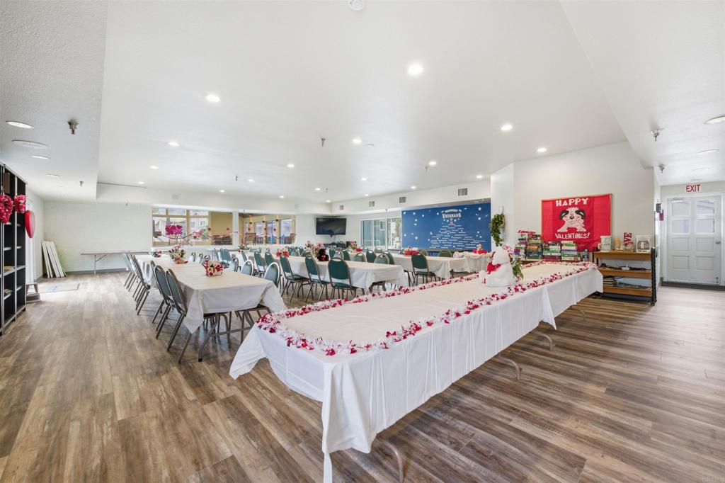8545 Mission Gorge Road, Unit SPC #147 Santee, CA 92071 - Photo 42 of 43 a living room with lots of furniture and a wooden floor