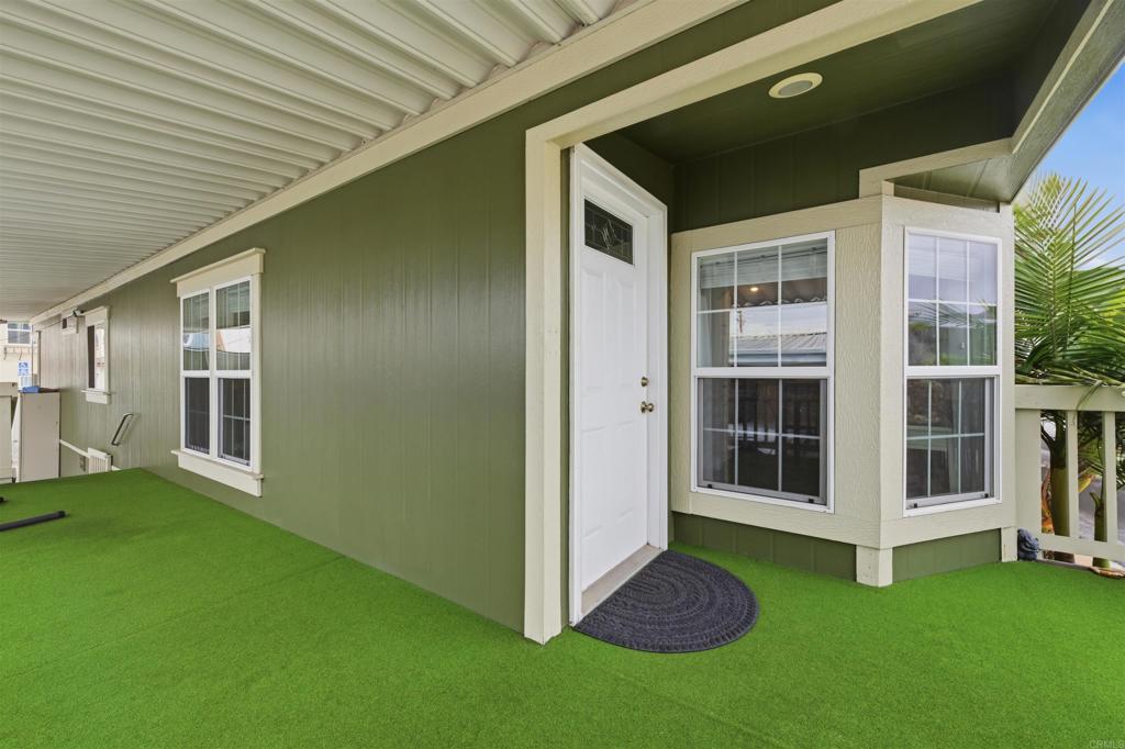 8545 Mission Gorge Road, Unit SPC #147 Santee, CA 92071 - Photo 6 of 43 a view of an house with backyard and porch