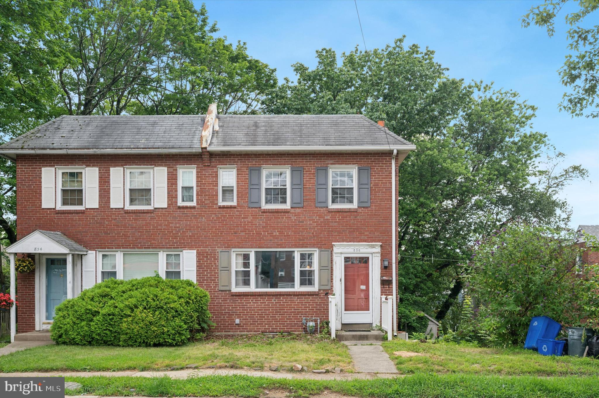 856 North Providence Road Media, PA 19063 - Photo 1 of 25 a front view of a house with garden