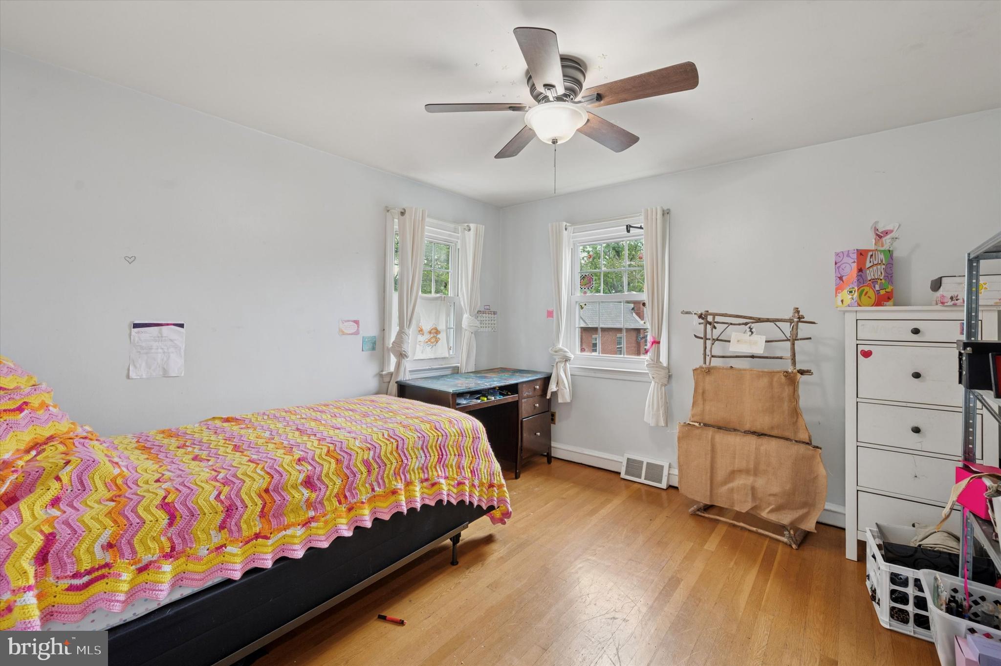 856 North Providence Road Media, PA 19063 - Photo 14 of 25 a bedroom with a bed and a chandelier