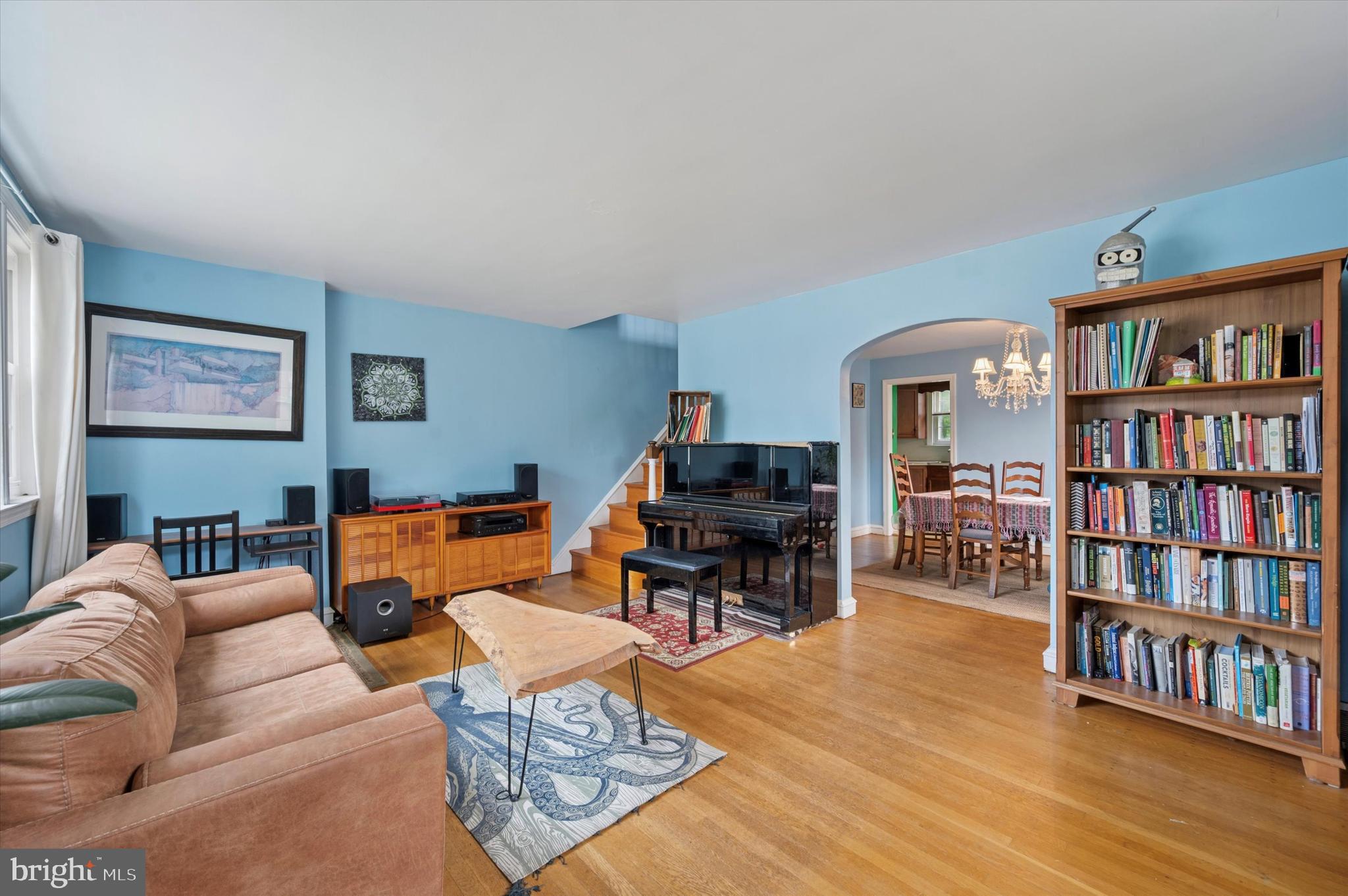856 North Providence Road Media, PA 19063 - Photo 3 of 25 a living room with furniture and a book shelf