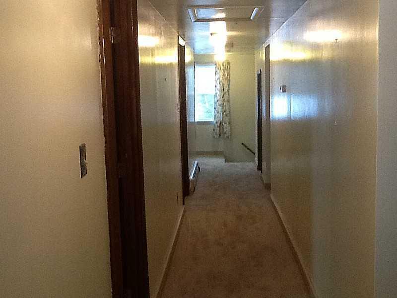 115 Houlton Road Presque Isle, ME 04769 - Photo 5 of 21 Other. remodeled hallway, note new rug