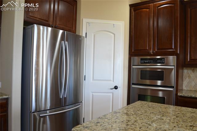 2353 Cinnabar Road Colorado Springs, CO 80921 - Photo 11 of 48 Stacked oven and microwave