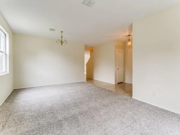 an empty room with a natural light
