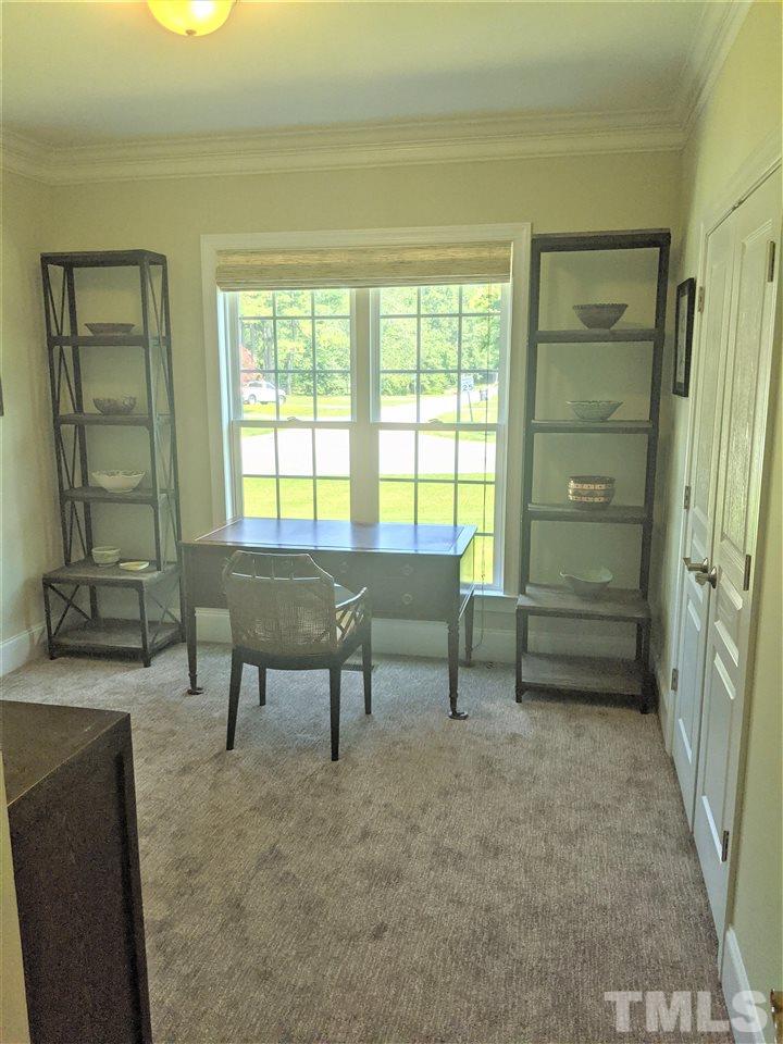 2729 Howard Road Raleigh, NC 27613 - Photo 16 of 26 a view of a livingroom with furniture and a window