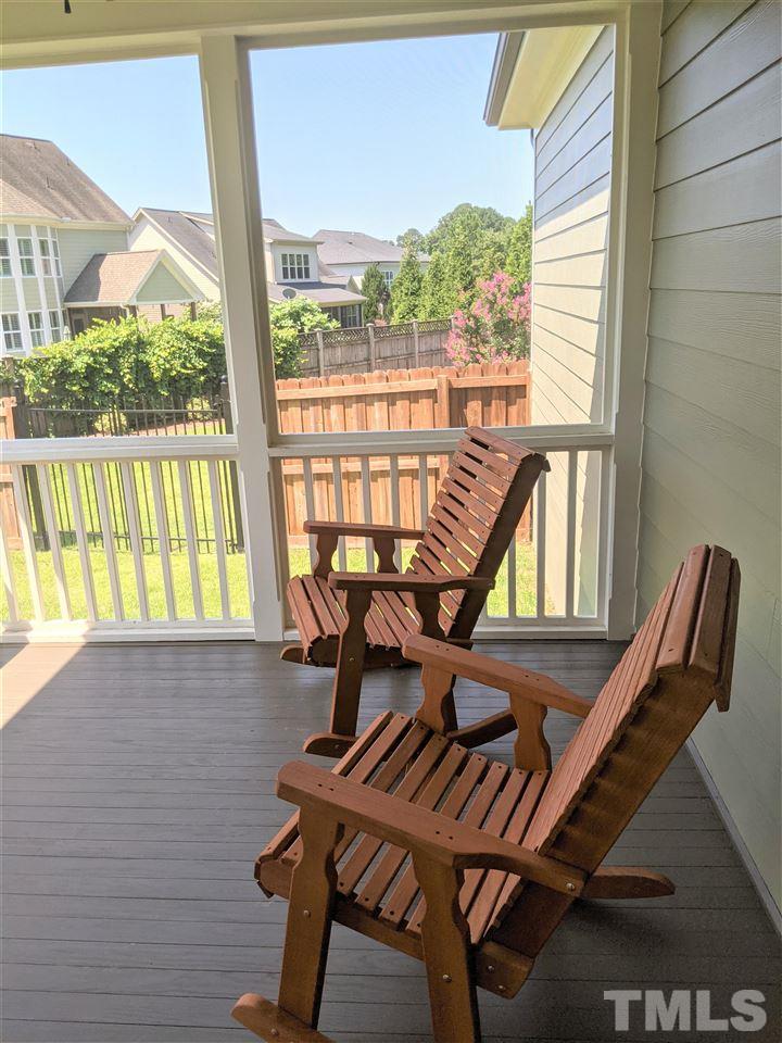2729 Howard Road Raleigh, NC 27613 - Photo 20 of 26 a view of a balcony with furniture