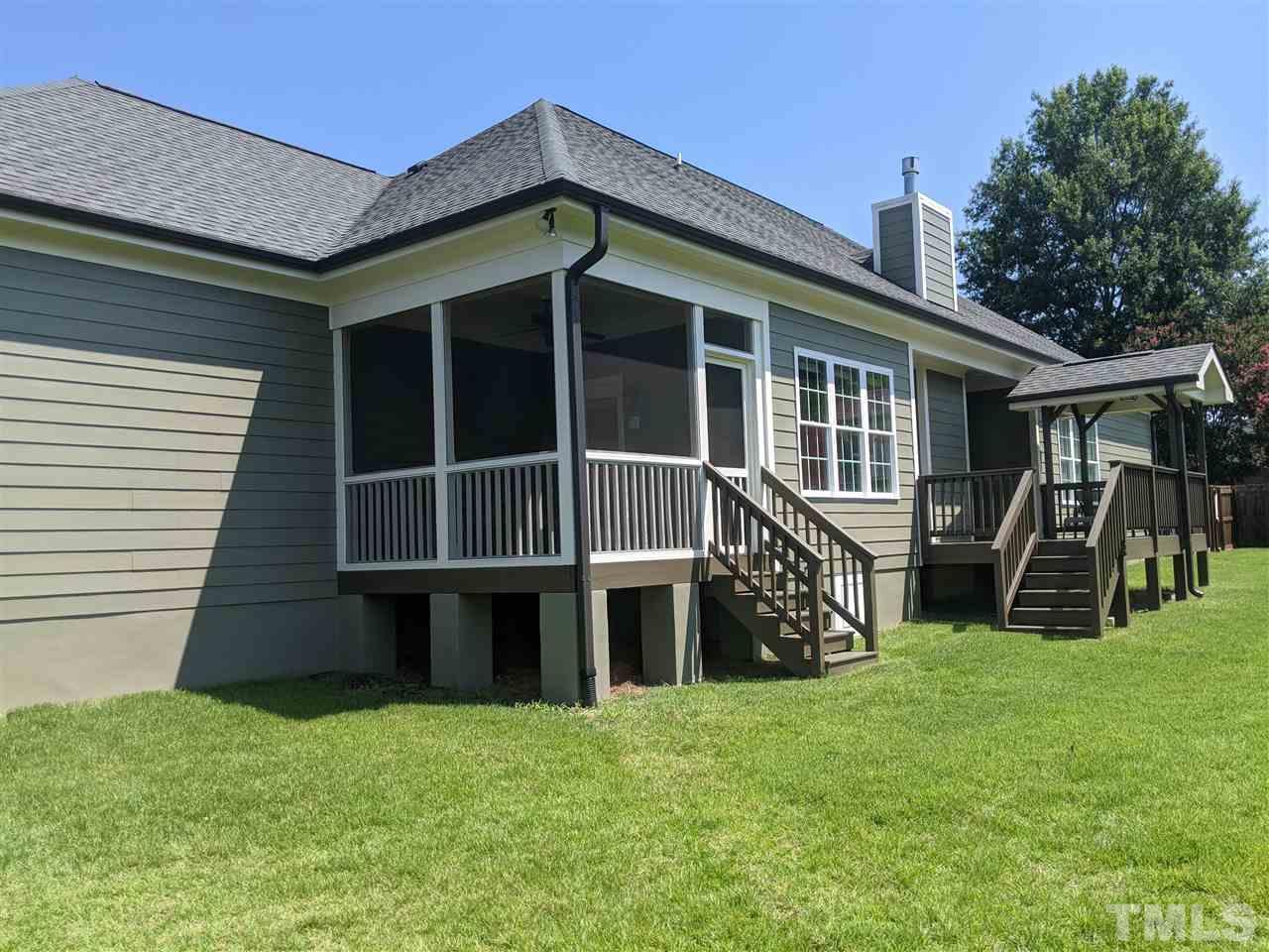 2729 Howard Road Raleigh, NC 27613 - Photo 21 of 26 a view of a house with yard