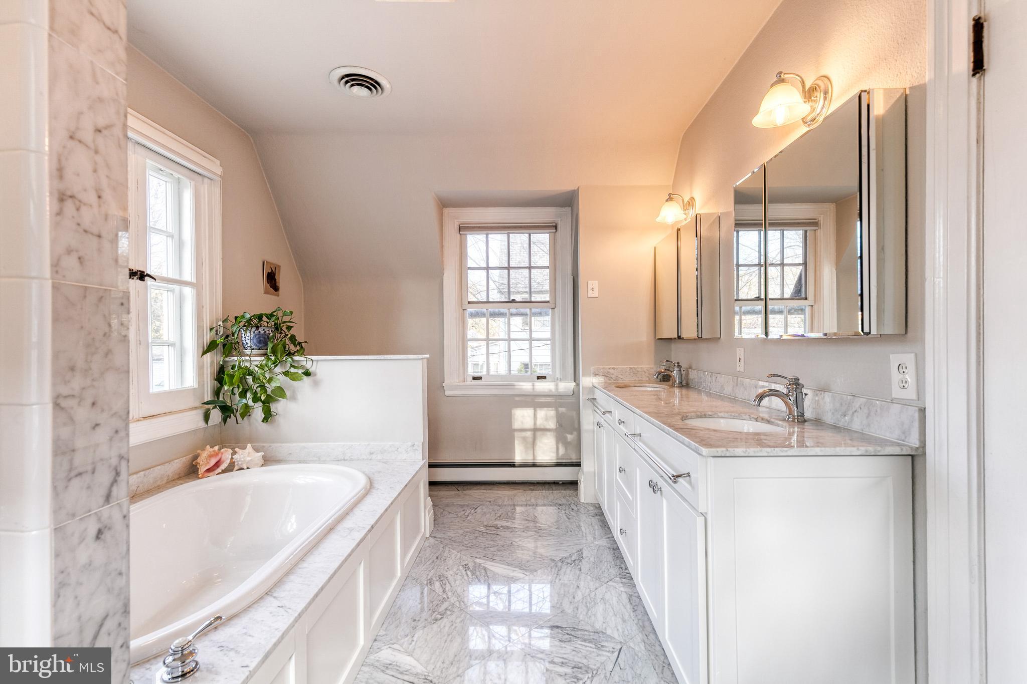 316 Broxton Road Baltimore, MD 21212 - Photo 32 of 53 Primary bath with marble, double vanity.