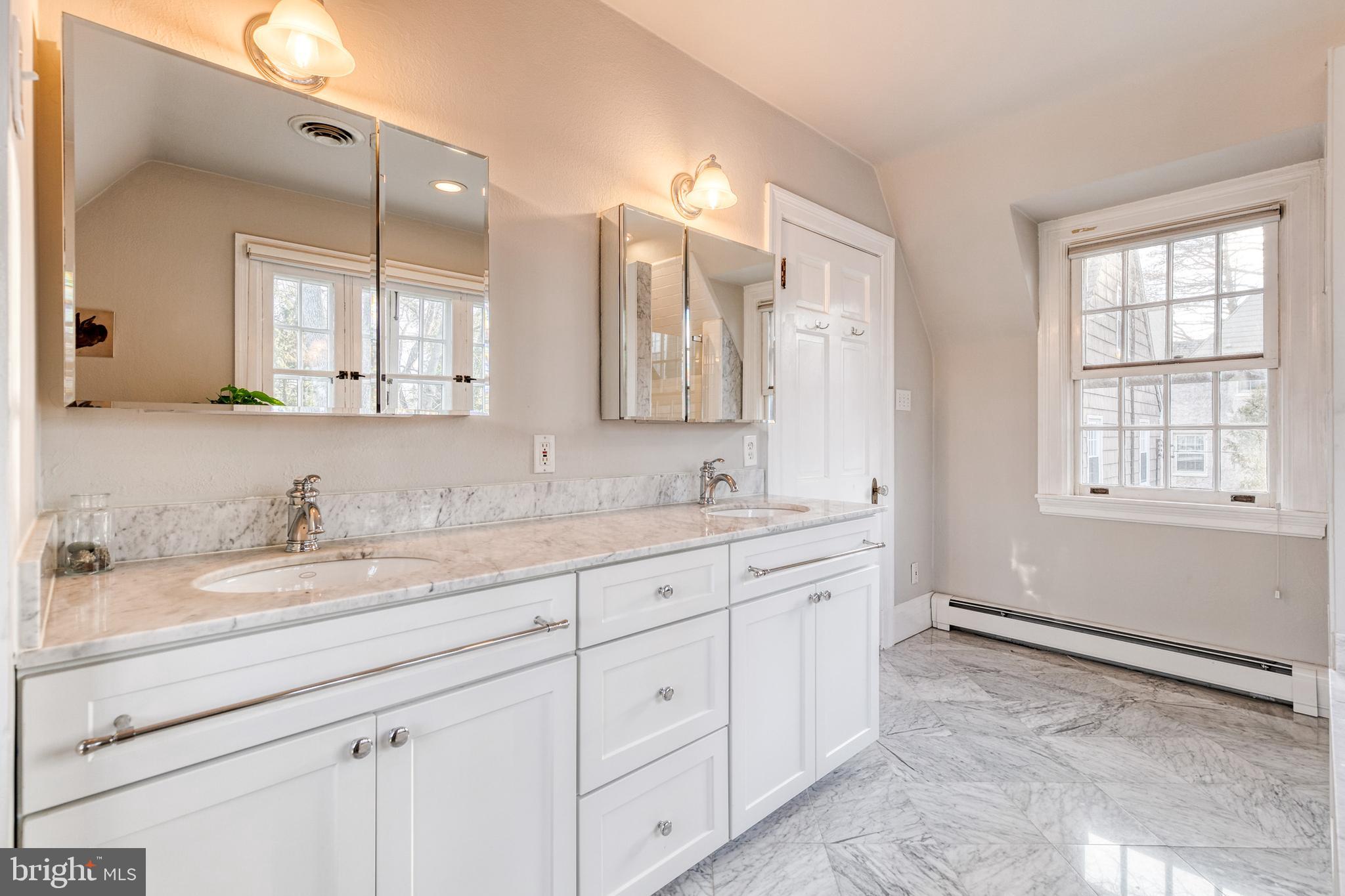 316 Broxton Road Baltimore, MD 21212 - Photo 34 of 53 Primary bath with marble, double vanity.