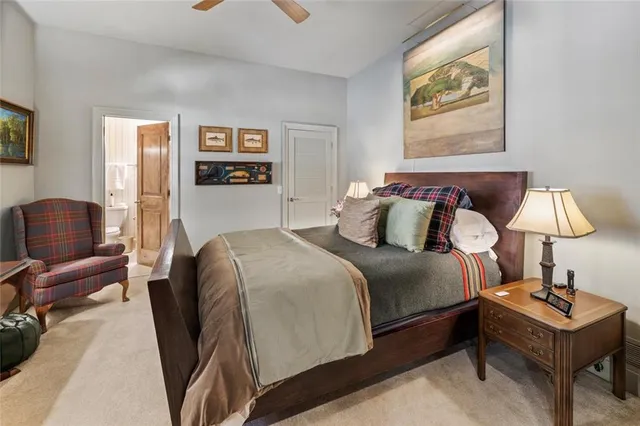 a view of balcony with chairs and potted plants