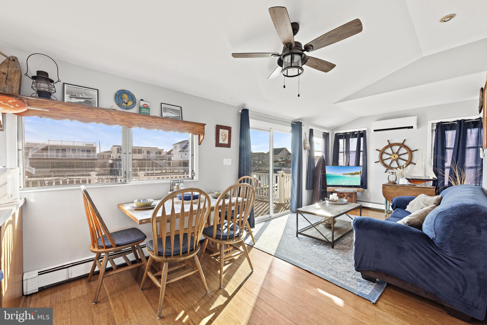 79 Dolphin Road Tuckerton, NJ 08087 - Photo 20 of 53 a view of a dining room with furniture window and wooden floor