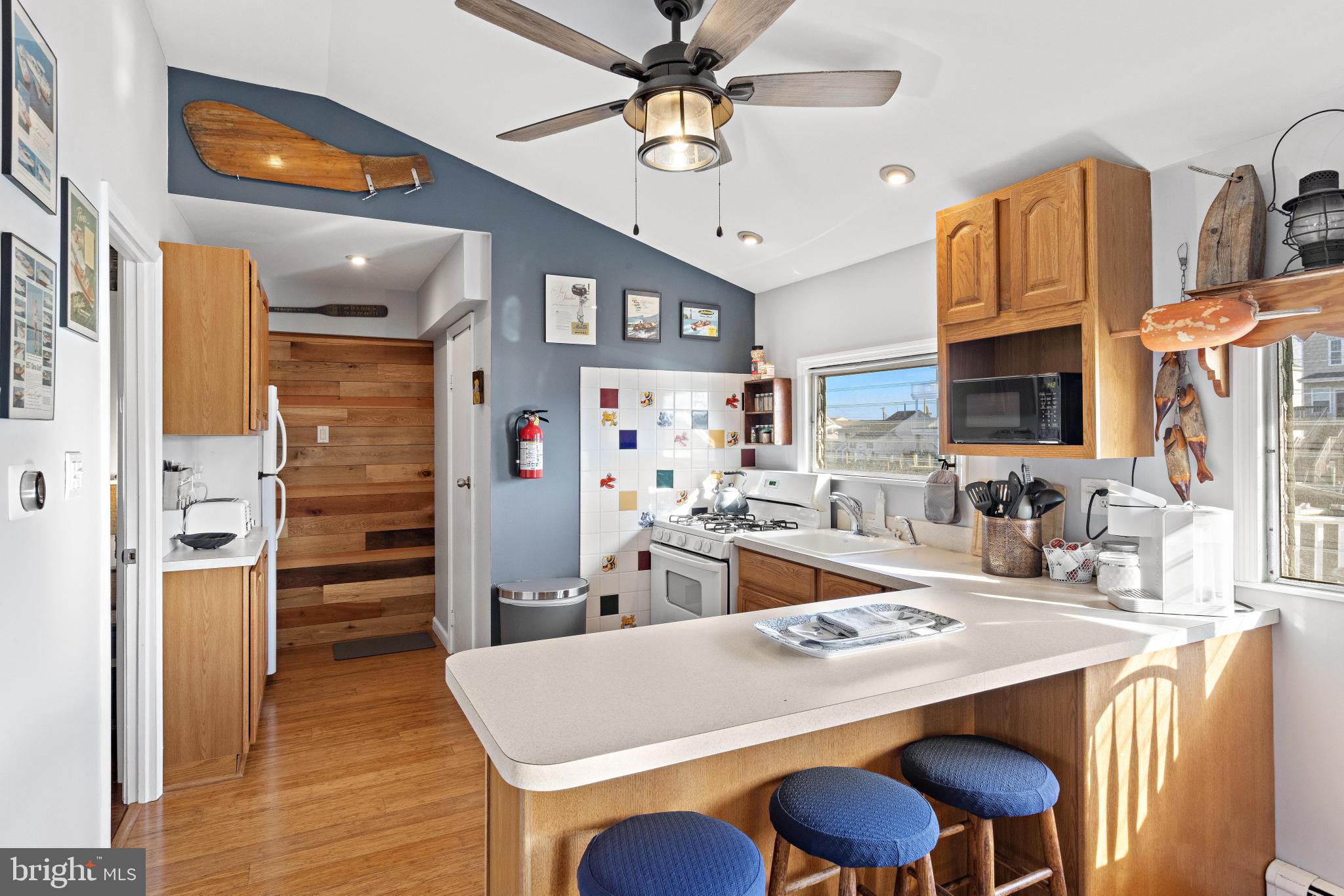 79 Dolphin Road Tuckerton, NJ 08087 - Photo 21 of 53 a view of a dining room with furniture and wooden floor