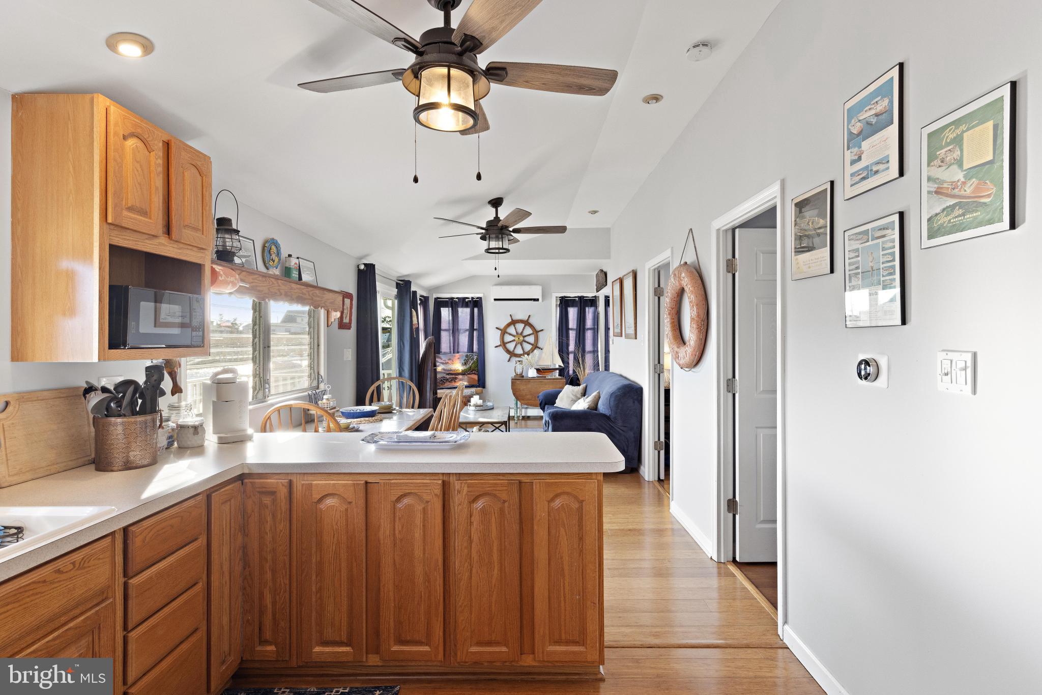 79 Dolphin Road Tuckerton, NJ 08087 - Photo 24 of 53 a view of a bathroom with a sink a mirror and a shower