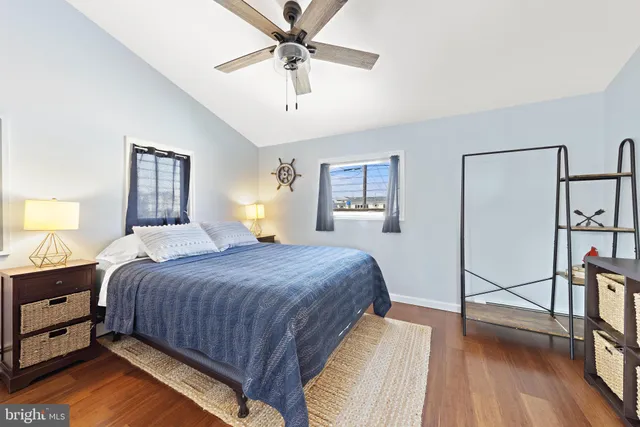 a view of a livingroom with furniture and wooden floor