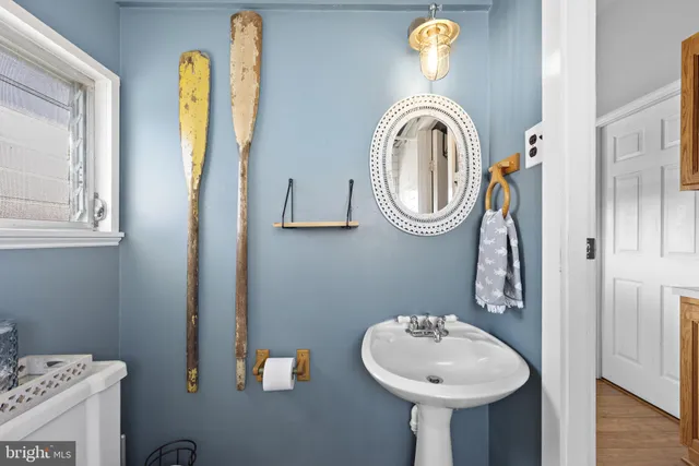 a bedroom with a bed and a table in it