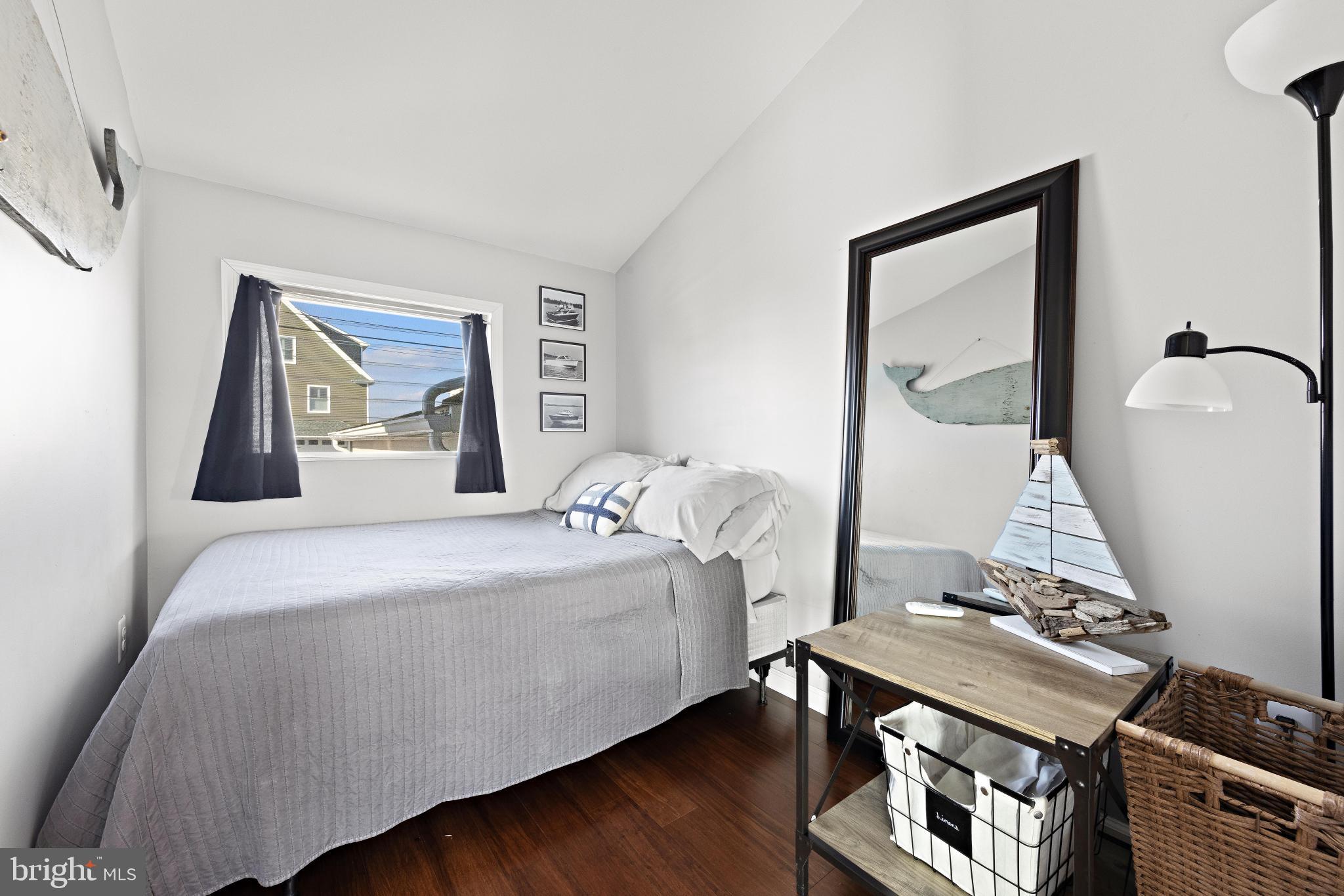 79 Dolphin Road Tuckerton, NJ 08087 - Photo 35 of 53 a bedroom with a bed and a table