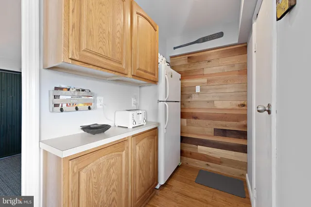 a view of a chairs and table in a room
