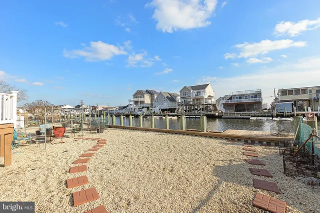 a patio with table and chairs