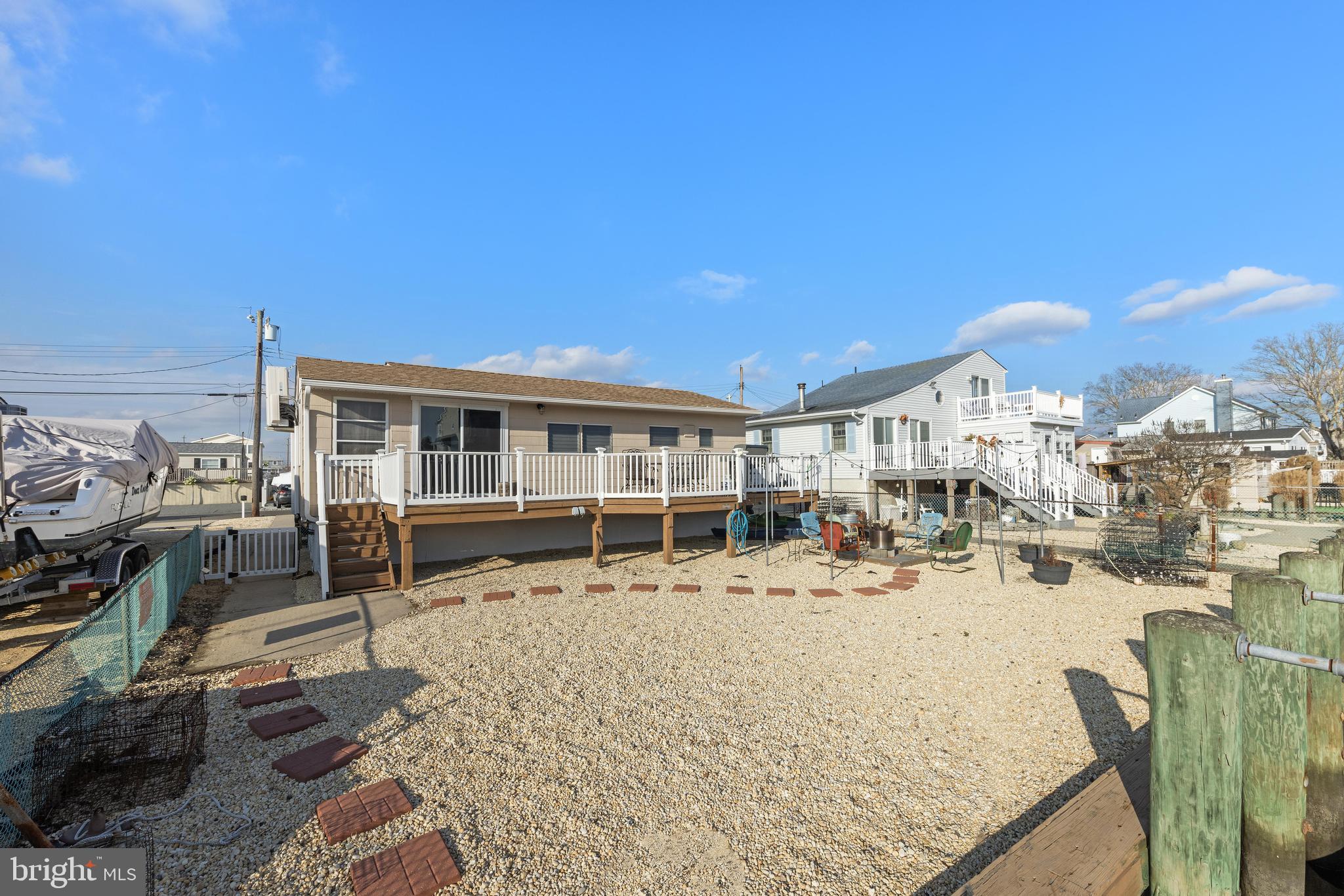 79 Dolphin Road Tuckerton, NJ 08087 - Photo 46 of 53 a view of a house with a yard