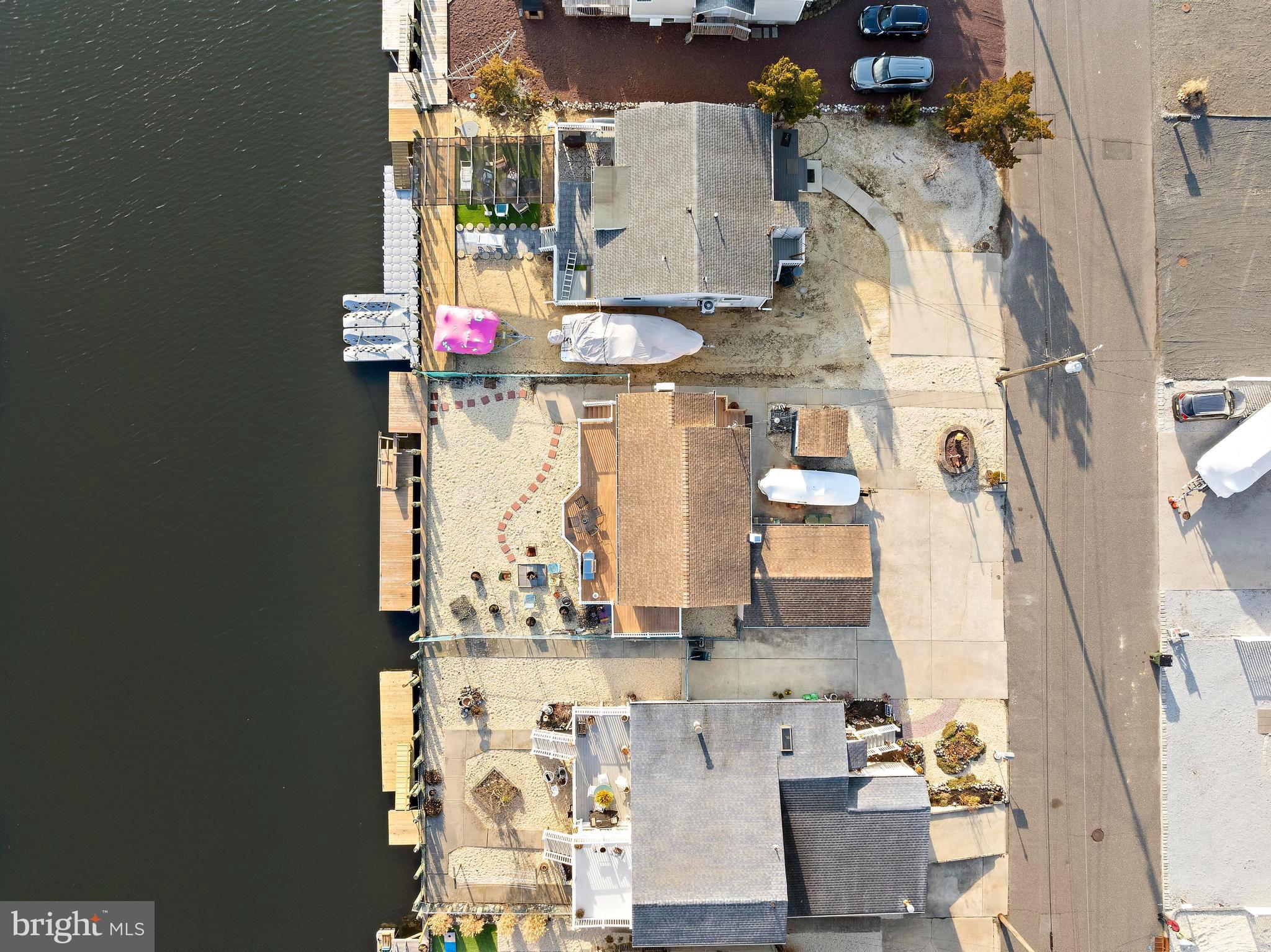 79 Dolphin Road Tuckerton, NJ 08087 - Photo 7 of 53 an aerial view of residential houses with outdoor space and parking