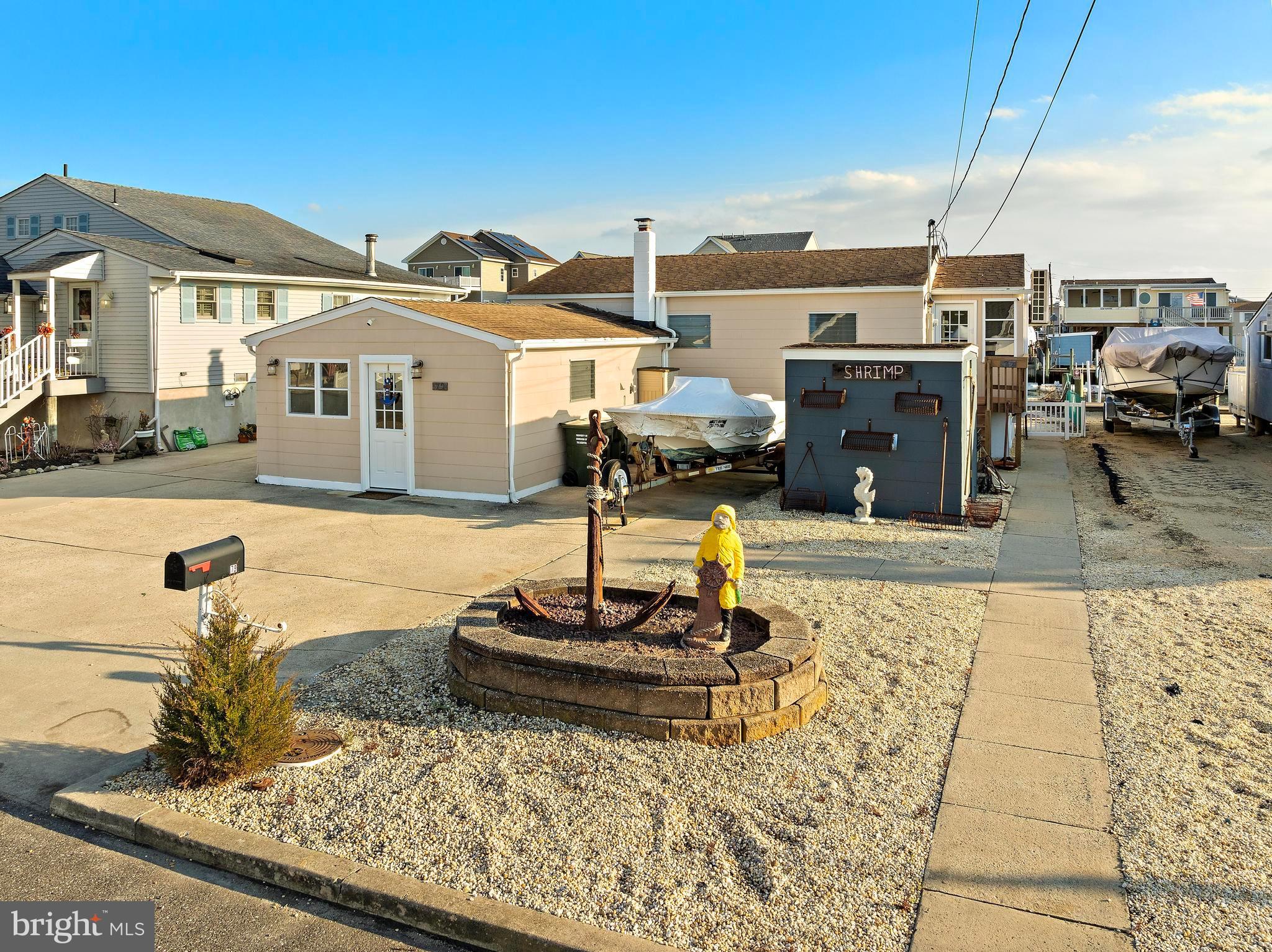 79 Dolphin Road Tuckerton, NJ 08087 - Photo 9 of 53 a front view of a house with garden