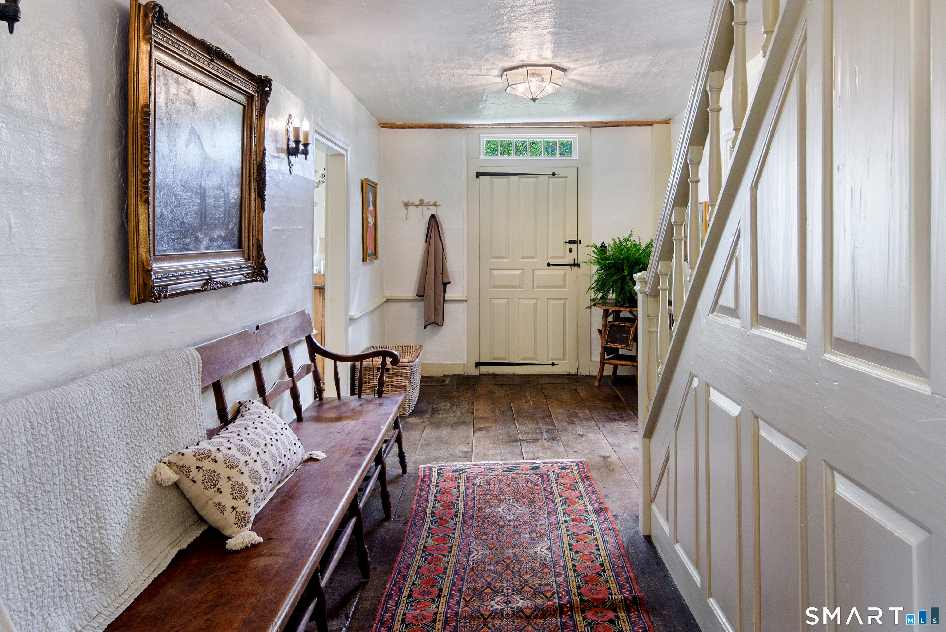 313 Umpawaug Road Redding, CT 06896 - Photo 7 of 40 a view of an entryway with wooden floor