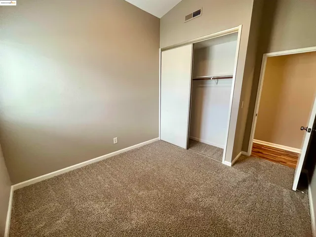 an empty room with closet