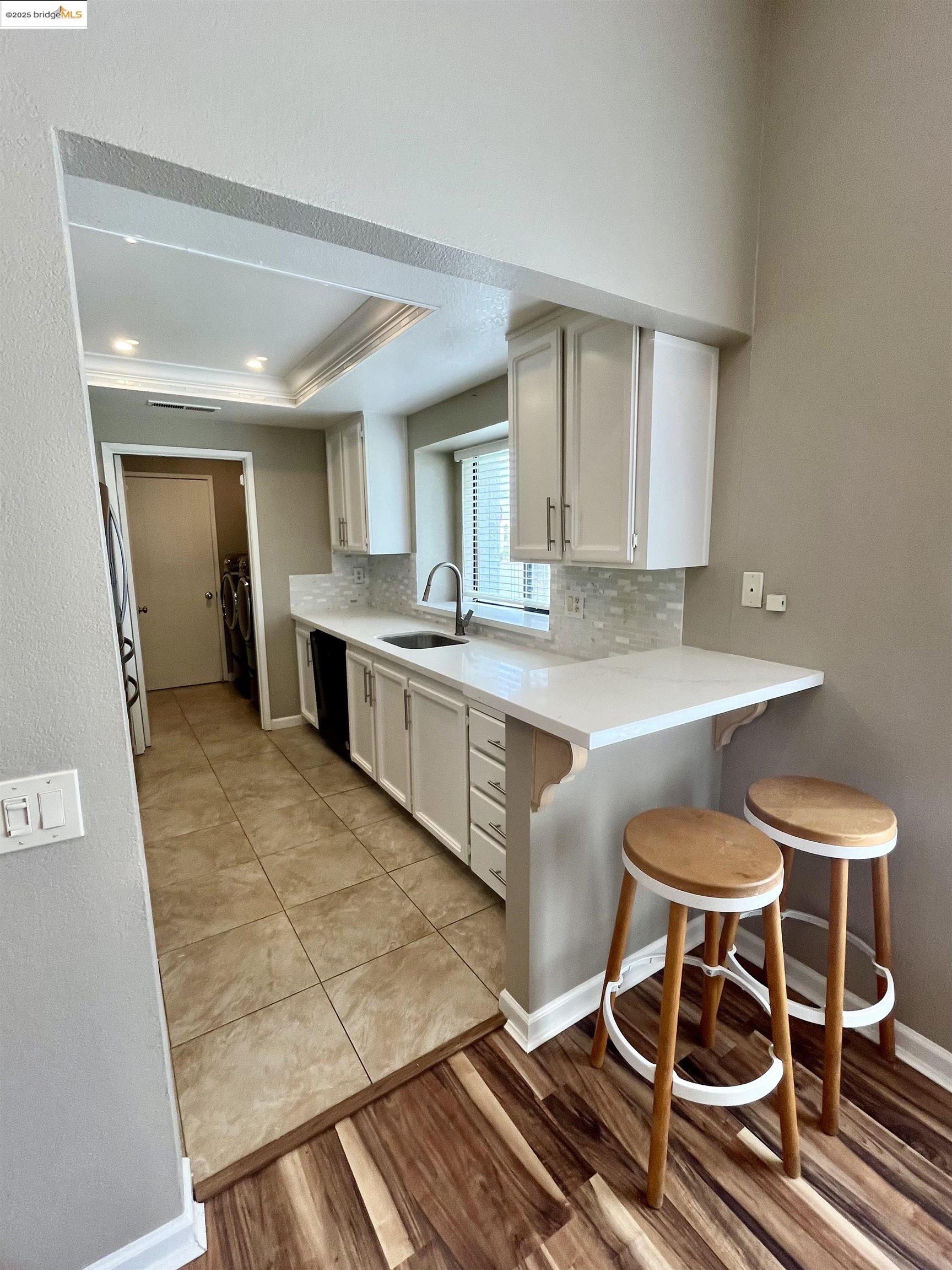5796 Cutter Loop Discovery Bay, CA 94505 - Photo 18 of 29 a kitchen with a stove a sink and a refrigerator