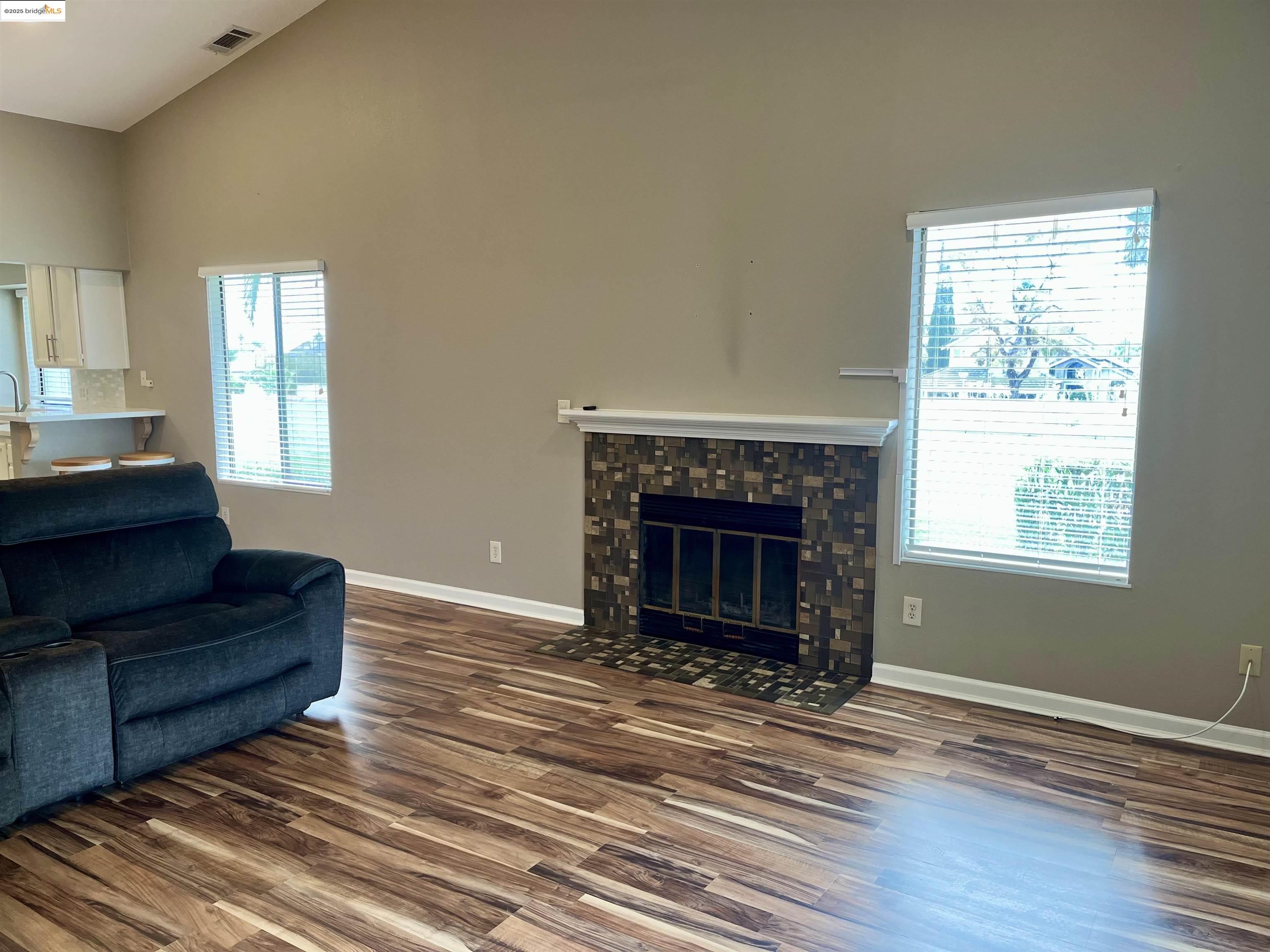 5796 Cutter Loop Discovery Bay, CA 94505 - Photo 6 of 29 a living room with furniture and a fireplace