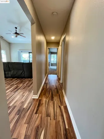 a view of a hallway with a couch