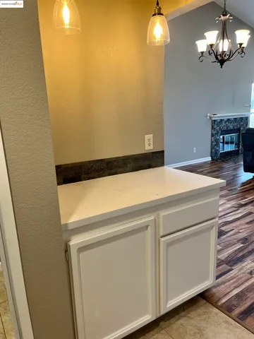 a view of a livingroom with a washer and dryer