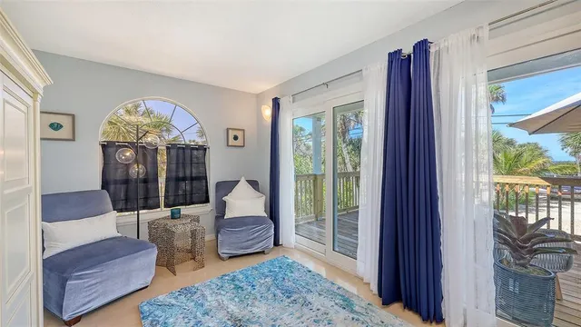 a patio with a patio table and chairs