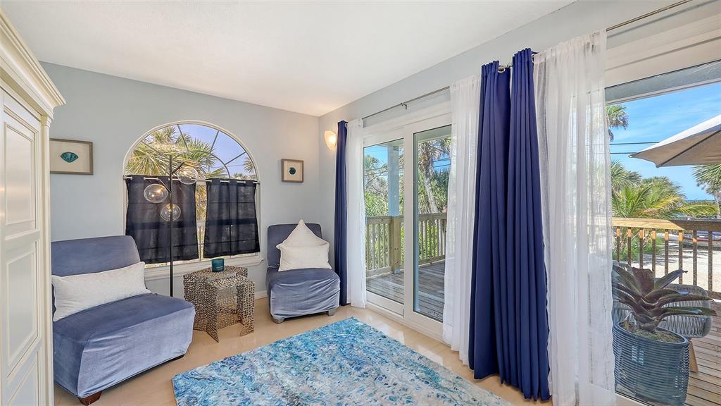 3604 Casey Key Road Nokomis, FL 34275 - Photo 29 of 94 a living room with furniture and a large window