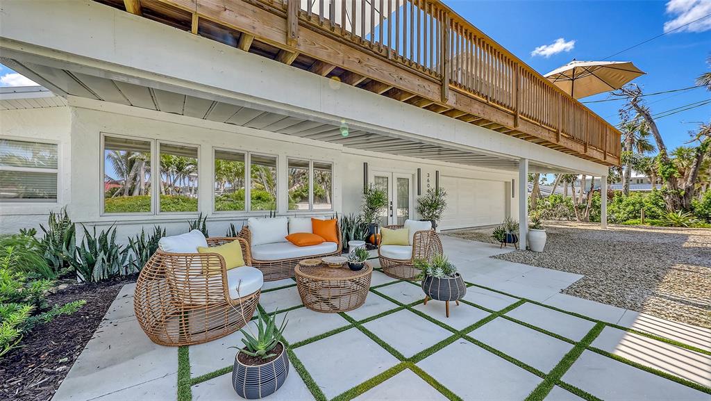 3604 Casey Key Road Nokomis, FL 34275 - Photo 3 of 94 a outdoor living space with furniture