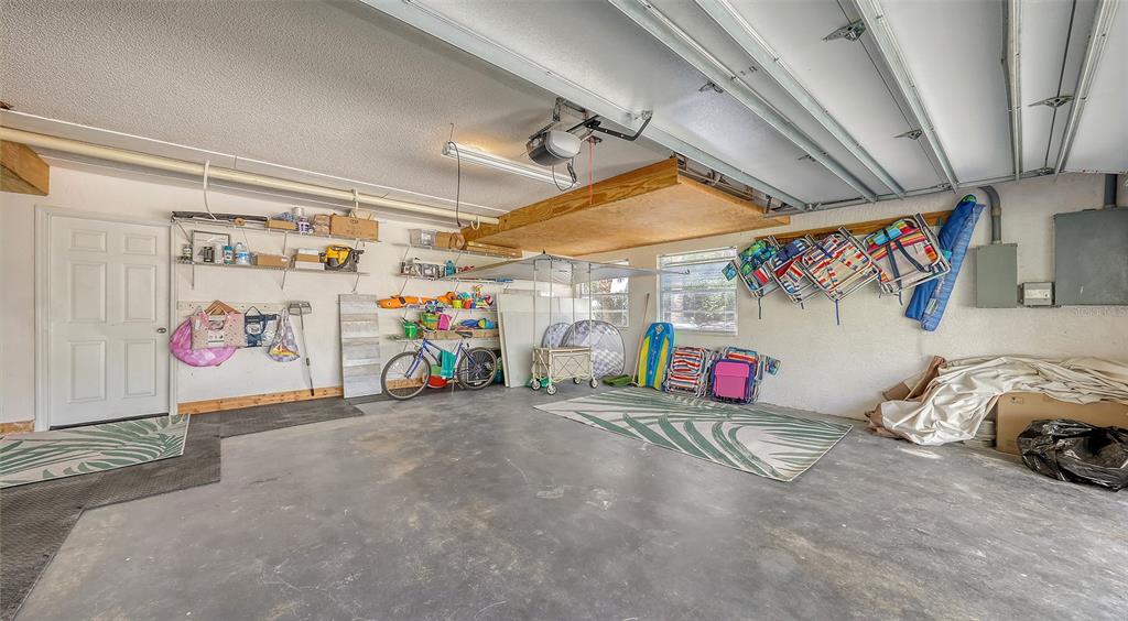 3604 Casey Key Road Nokomis, FL 34275 - Photo 76 of 94 a view of a garage with red white