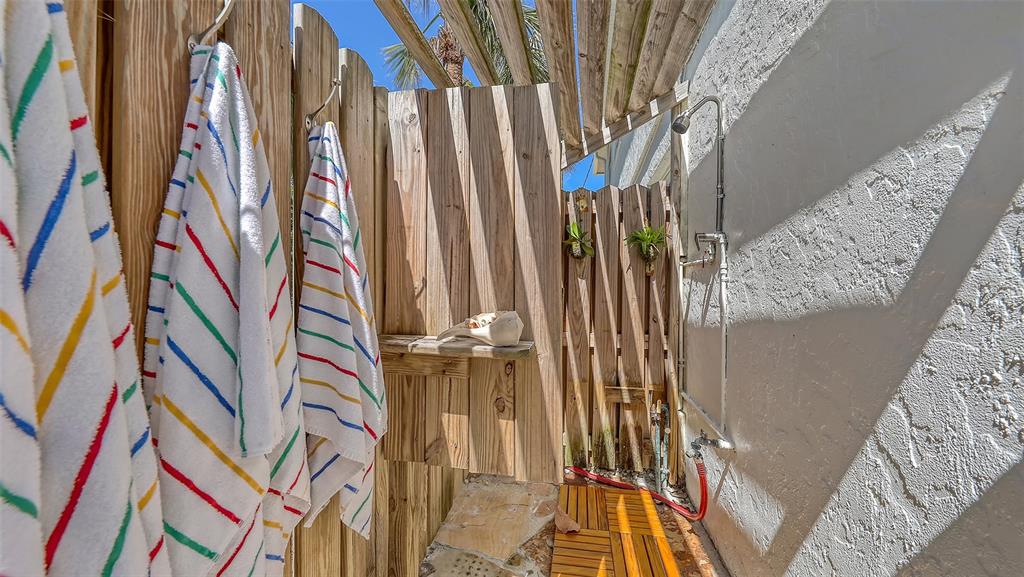 3604 Casey Key Road Nokomis, FL 34275 - Photo 77 of 94 a view of a flower pot with wooden floor