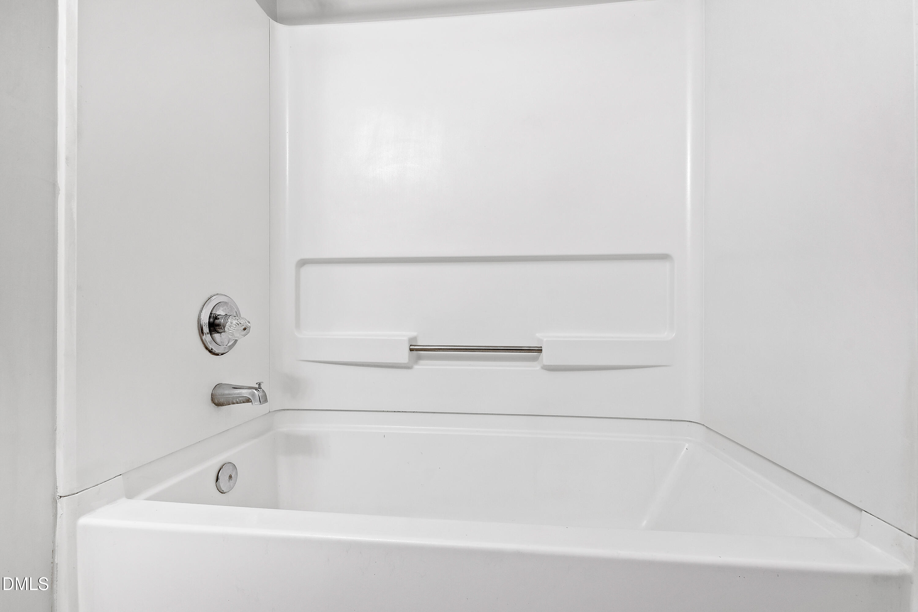 2100 Wolf Tech Lane, Unit 204 Raleigh, NC 27603 - Photo 24 of 40 a bathroom with a bathtub