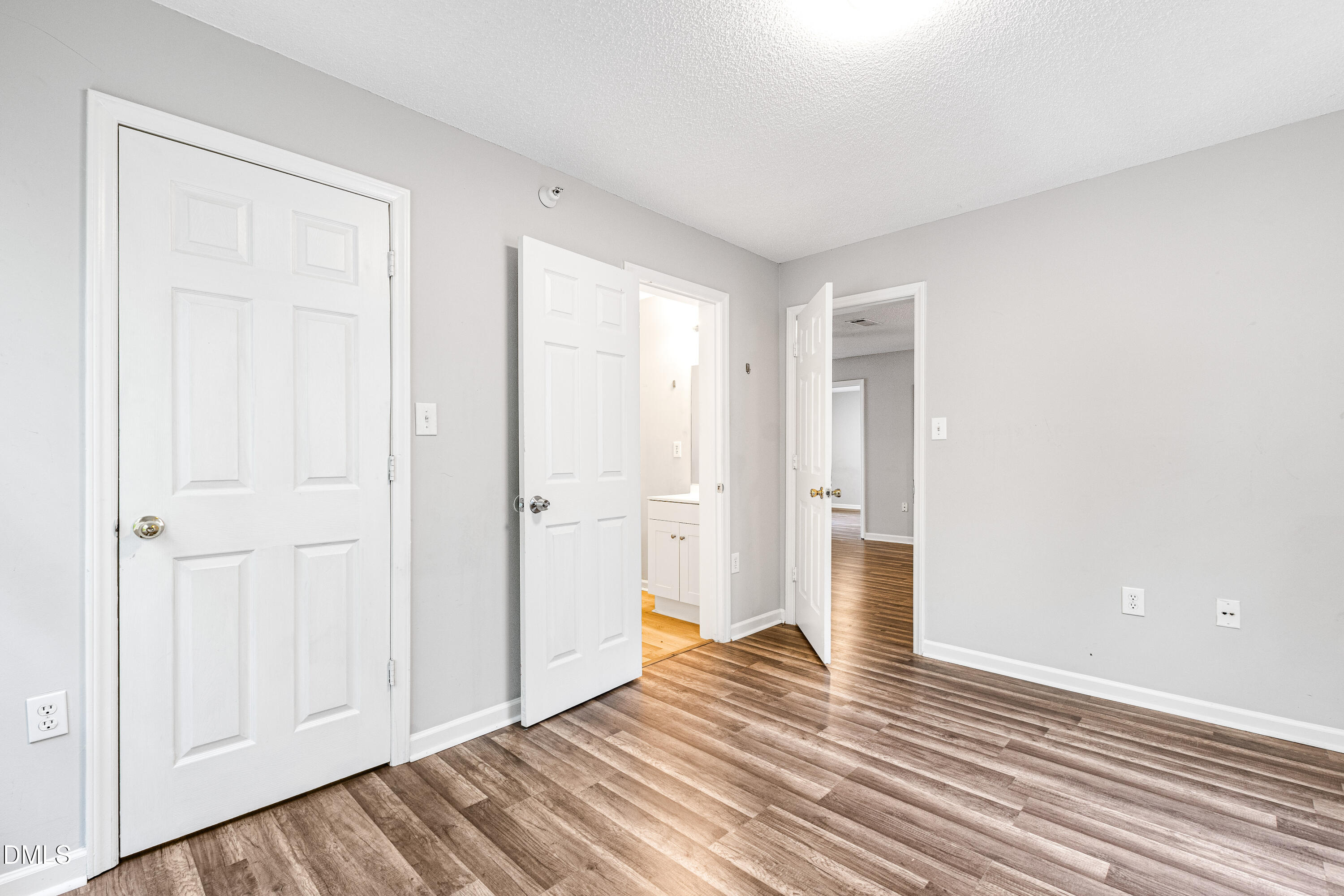 2100 Wolf Tech Lane, Unit 204 Raleigh, NC 27603 - Photo 36 of 40 a view of empty room with wooden floor