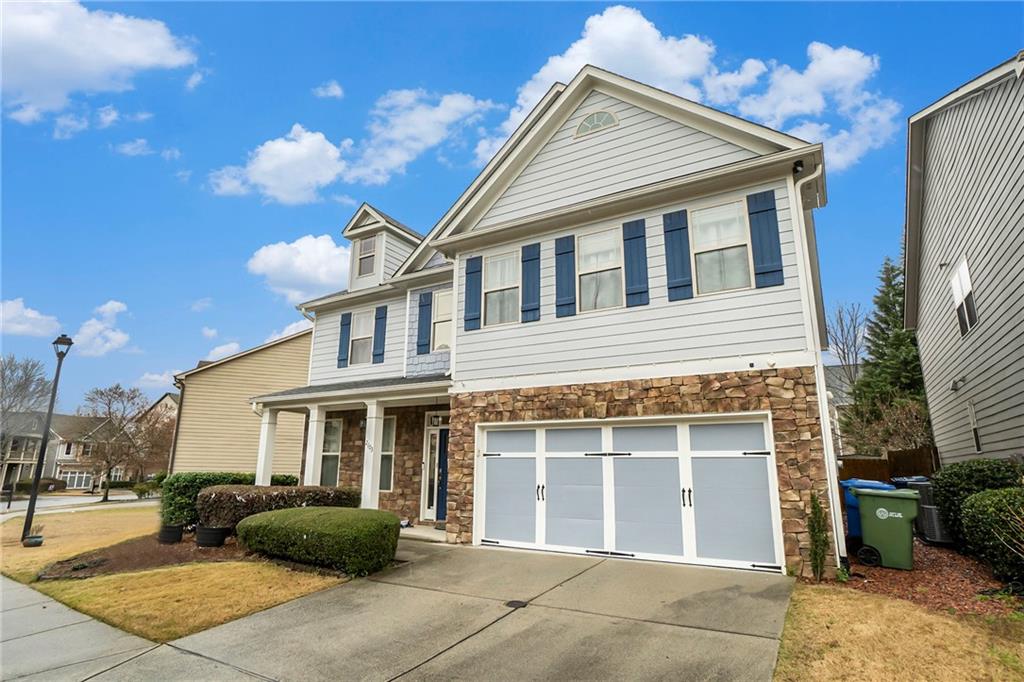 2103 Old Georgian Terrace Atlanta, GA 30318 - Photo 1 of 1 a front view of a house with a yard