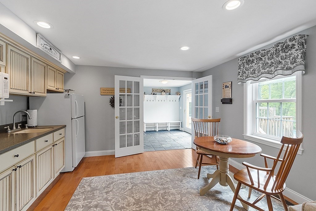 113 Green Road Bolton, MA 01740 - Photo 17 of 41 a view of a kitchen and dining room